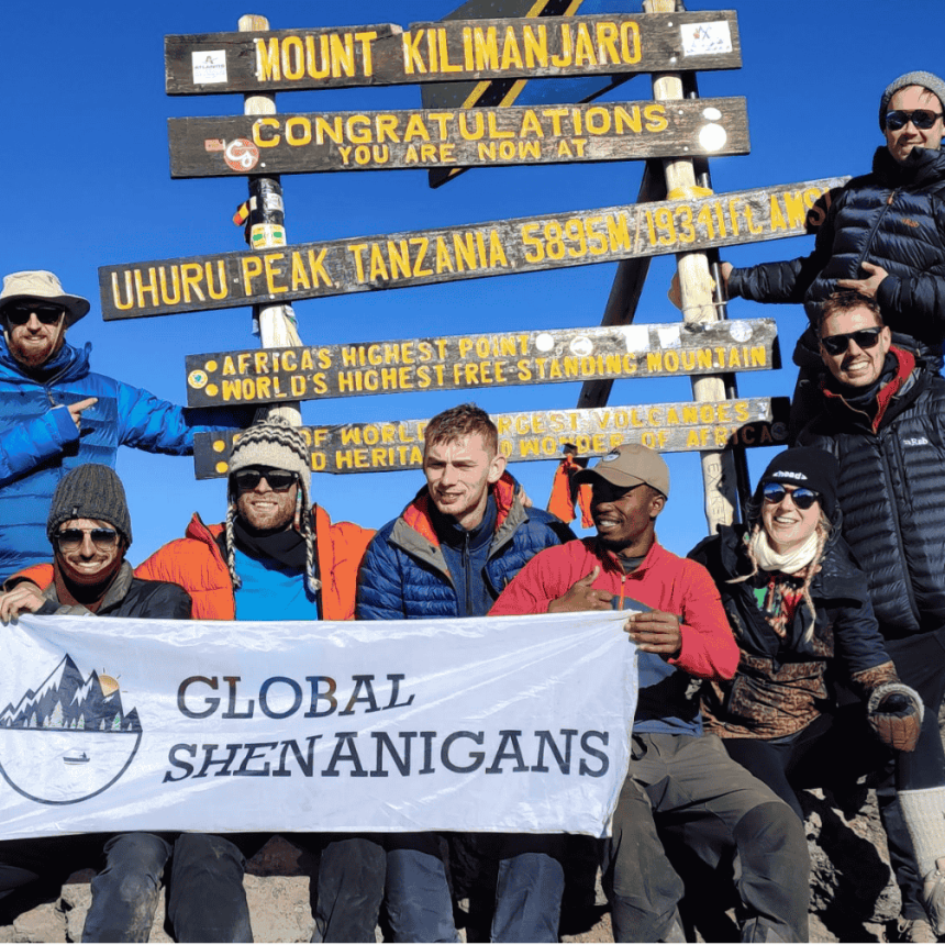 Hikers approaching Mount Kilimanjaro on the Machame Route